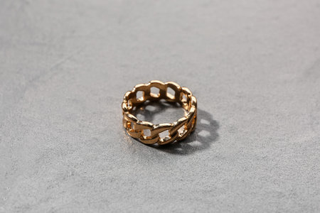 Beautiful ring on gray background