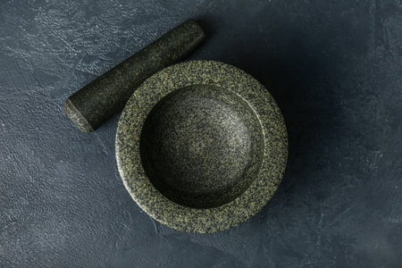 Mortar and pestle on dark backgroundの写真素材