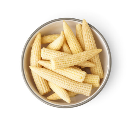 Bowl of tasty canned corn cobs on white backgroundの写真素材