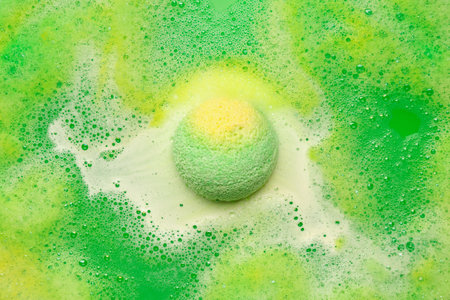 Bath bomb dissolving in waterの写真素材