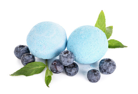 Bath bombs with blueberries on white backgroundの写真素材