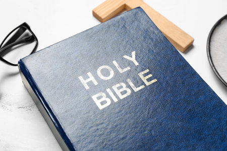 Holy Bible on white marble background, closeupの写真素材