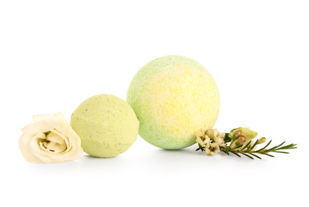 Bath bombs with flowers on white backgroundの写真素材