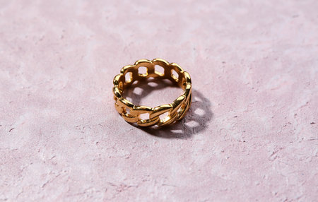 Beautiful ring on gray grunge background