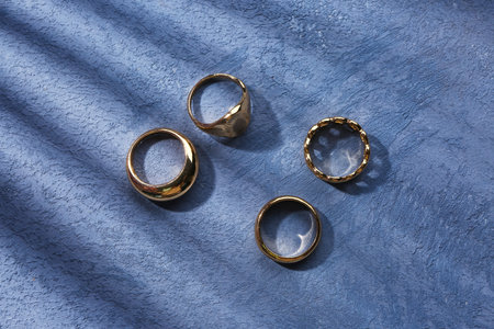 Beautiful rings on blue grunge background