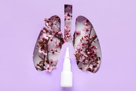 Nasal drops with blooming branches visible through cut lilac paper. Seasonal allergy conceptの写真素材
