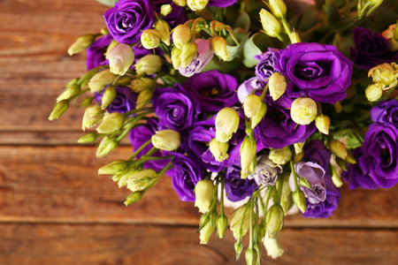 Eustoma flowers on wooden tableの写真素材