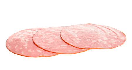 Slices of tasty boiled sausage on white backgroundの写真素材