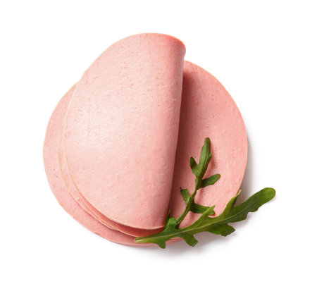 Slices of tasty boiled sausage and arugula on white backgroundの写真素材