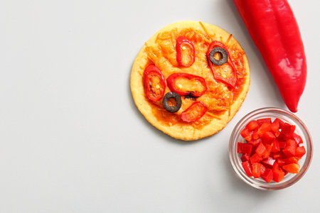 Tasty mini pizza on gray backgroundの写真素材