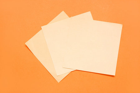 Sticky notes on orange background