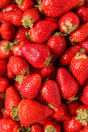 Texture of fresh strawberries as backgroundの写真素材
