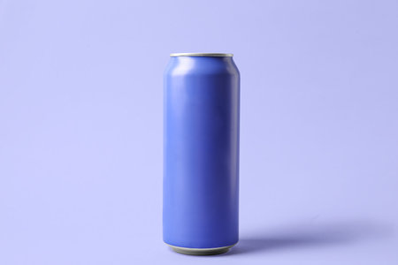 Can of fresh soda on lilac background