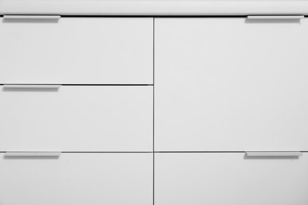 White drawers in kitchenの写真素材