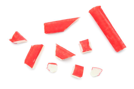 Tasty cut crab sticks isolated on white backgroundの写真素材