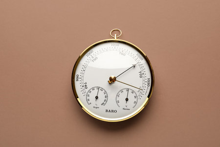 Aneroid barometer on brown backgroundの写真素材