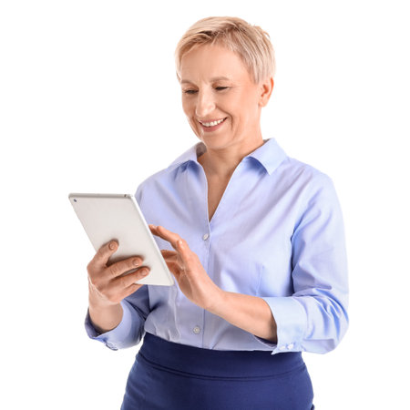 Mature businesswoman with tablet computer on white backgroundの写真素材