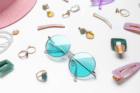 Accessories with sunglasses on white background, closeupの写真素材