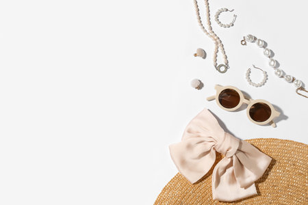 Jewelry with sunglasses and summer hat on white backgroundの写真素材