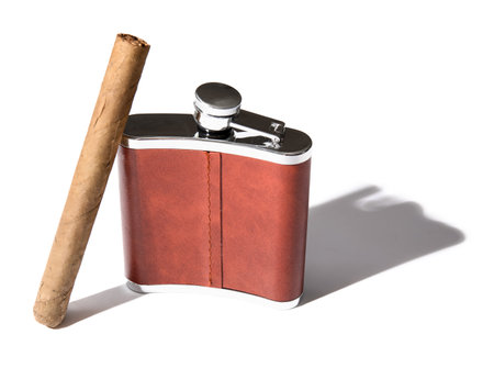 New hip flask and cigar isolated on white backgroundの写真素材