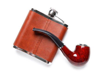 New hip flask and smoking pipe isolated on white backgroundの写真素材