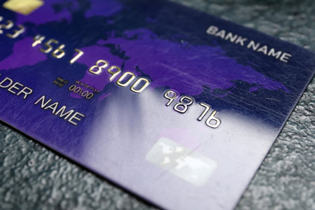 Credit card on dark green grunge tableの写真素材