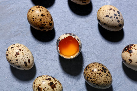 Fresh quail eggs on blue backgroundの写真素材