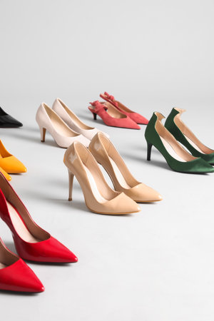 Many different stylish high heels on gray backgroundの写真素材