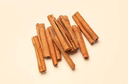 Aromatic cinnamon sticks on color backgroundの写真素材