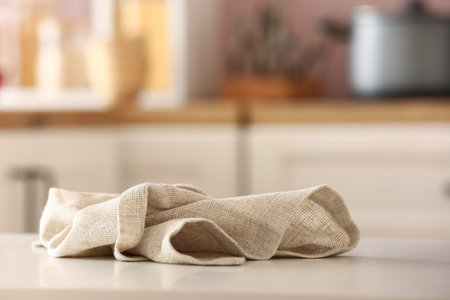 Crumpled napkin on table in kitchenの写真素材