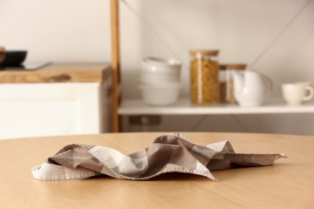 Crumpled napkin on table in kitchenの写真素材