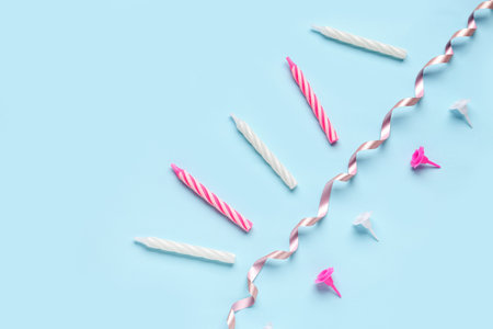 birthday candles on blue backgroundの写真素材