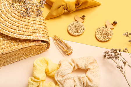 Composition with stylish female accessories and dried flowers on color background, closeupの写真素材