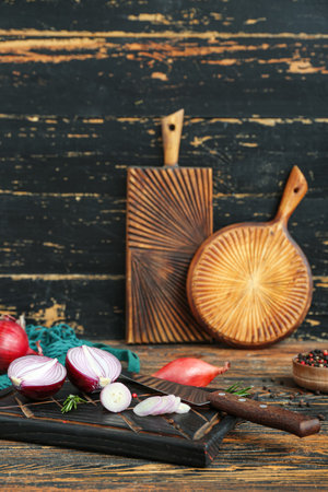 Boards with different kinds of onion on brown wooden backgroundの写真素材