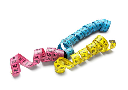 Measuring tapes on white backgroundの写真素材