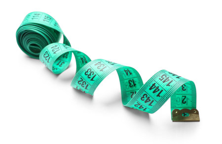 Green tape measure on white background