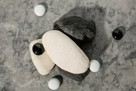 Decorative stone podiums on gray tableの写真素材