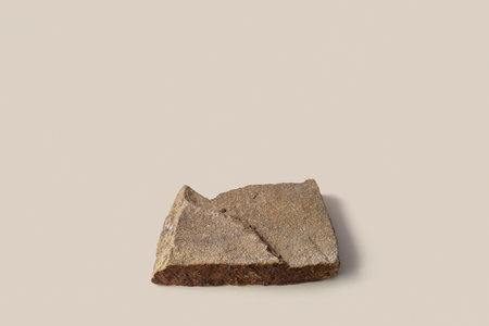 decorative stone podium on white backgroundの写真素材