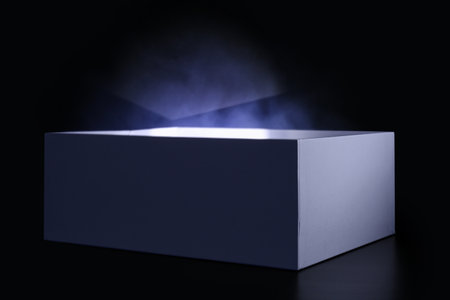 Camera flash in box on black backgroundの写真素材