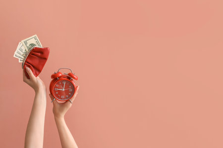 Woman with alarm clock, wallet and dollar banknotes on color background