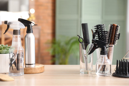 Different hairdressing tools on table in beauty salonの写真素材