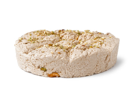 Tasty Tahini halva with pistachios on white backgroundの写真素材