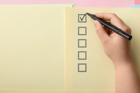 Woman marking on checklist box with black marker
