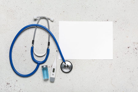 Blank card, stethoscope, ampule and thermometer on color background. melanoma conceptの写真素材