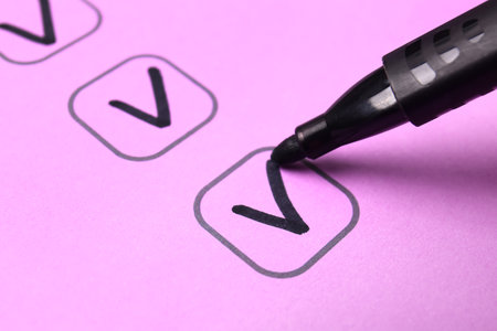 Black pen marking on checklist box, closeupの写真素材