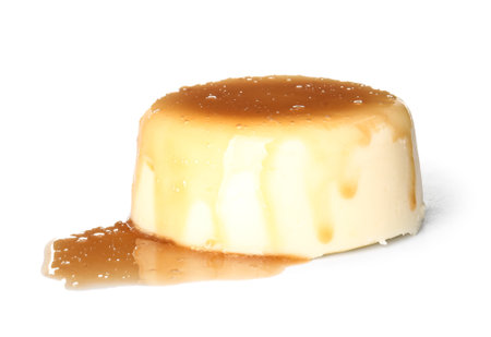 Delicious pudding covered by caramel syrup isolated on white backgroundの写真素材