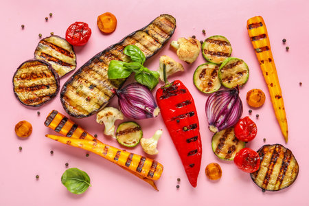 Grilled vegetables on pink backgroundの写真素材