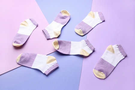 Many cotton socks on color backgroundの写真素材