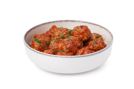 Bowl of tasty meatballs with sauce on white backgroundの写真素材