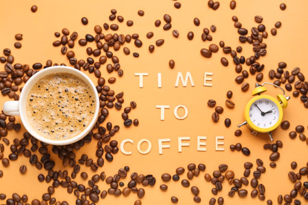 Text TIME TO COFFEE and cup of hot espresso with beans on orange backgroundの写真素材